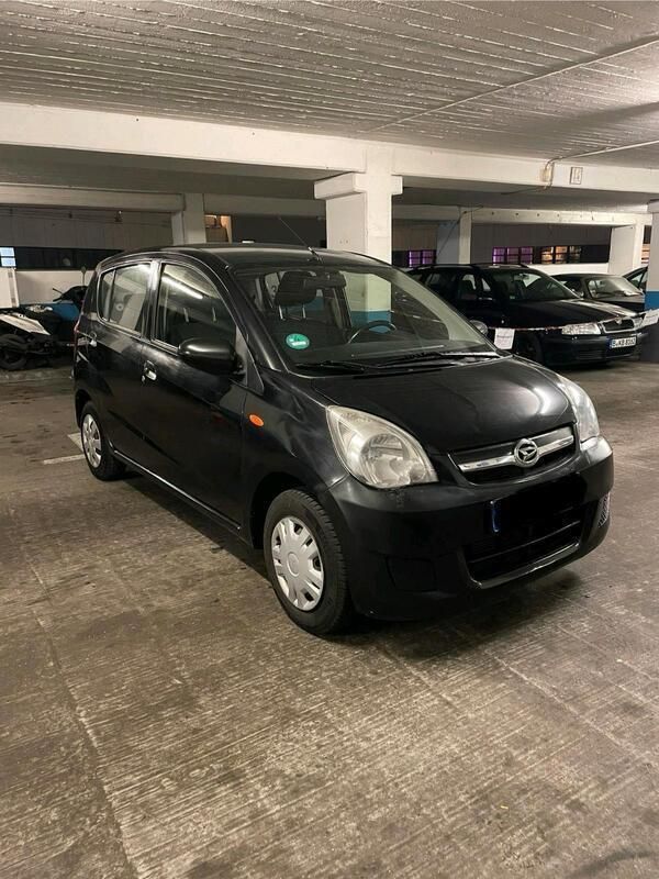 Schwarz Gebraucht 2009 Daihatsu Cuore Kleinwagen | 1.350 € - Bild 1/4