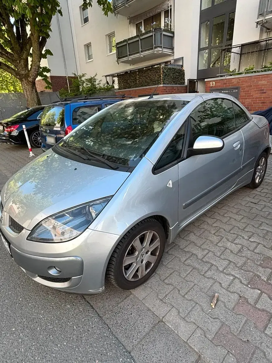 Second-hand Mitsubishi Colt 150 CP (110 kW) 2006 Gri Cabrio
