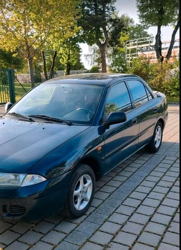Grün Gebraucht 1998 Mitsubishi Carisma Limousine | 600 € (Superpreis) - Bild 1/4