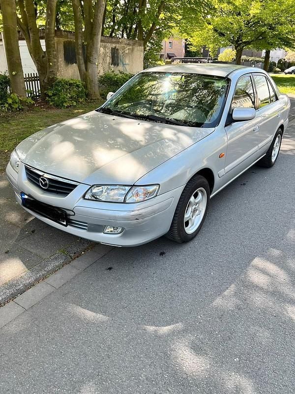 Second-hand Mazda 626 115 CP (84 kW) 2000 Argintiu Berlinǎ