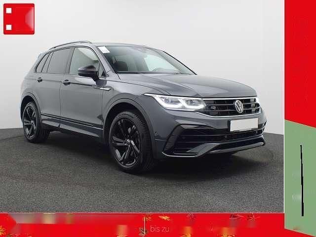 Grau metallic Gebraucht 2024 VW Tiguan R-line SUV | 43.420 € (Fairer Preis) - Bild 1/3