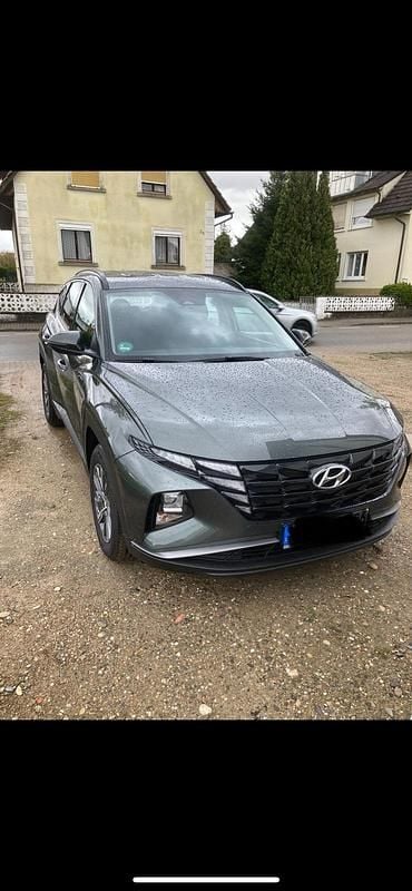 Grau Gebraucht 2021 Hyundai Tucson SUV | 22.990 € (Fairer Preis) - Bild 1/4