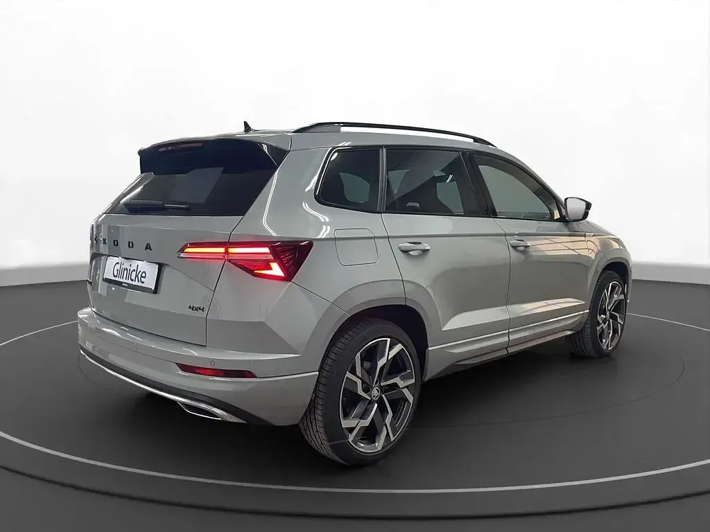 Gebraucht Skoda Karoq SportLine 190 PS (139 kW) 2023 Steelgrau SUV