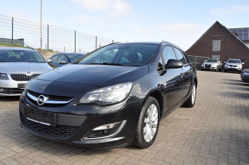 Karbonschw graphitschw midnigh Gebraucht 2013 Opel Astra Active Kombi | 3.990 € (Fairer Preis) - Bild 1/4