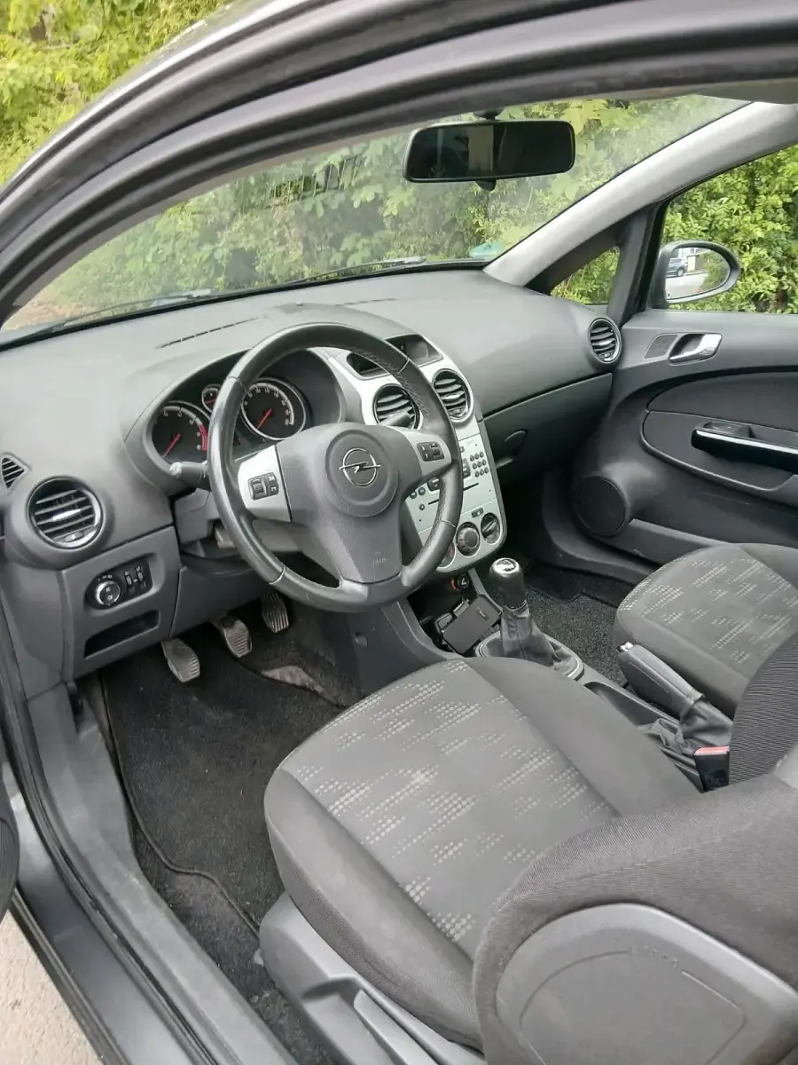 Gebraucht Opel Corsa 69 PS (50 kW) 2011 Grau Kleinwagen
