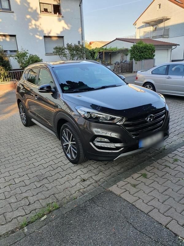 Braun Gebraucht 2018 Hyundai Tucson Passion SUV | 15.900 € (Superpreis) - Bild 1/4