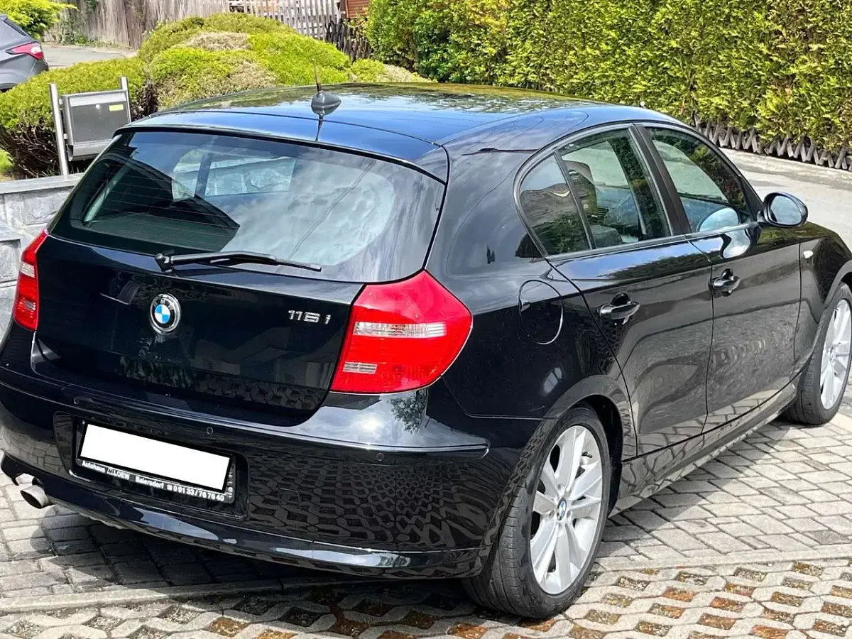 Używany BMW 116 122 KM (89 kW) 2009 Czarny Hatchback