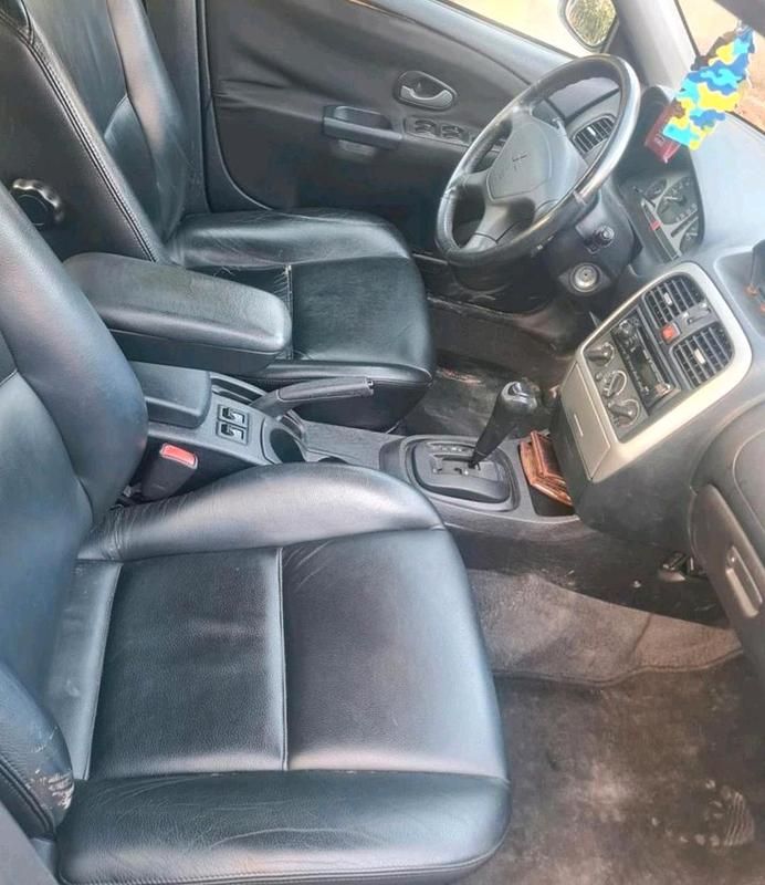 Gebraucht Mitsubishi Carisma 125 PS (91 kW) 2003 Silber Limousine