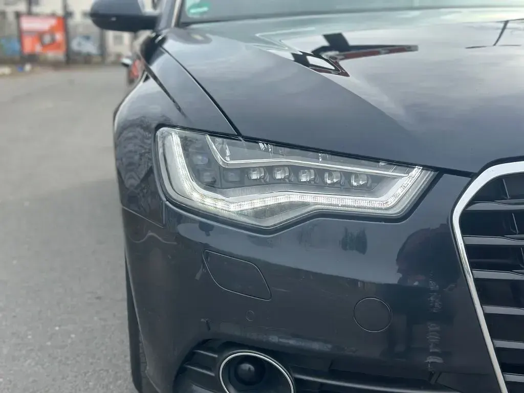 Używany Audi A6 Ambiente 245 KM (180 kW) 2014 Niebieski Kombi