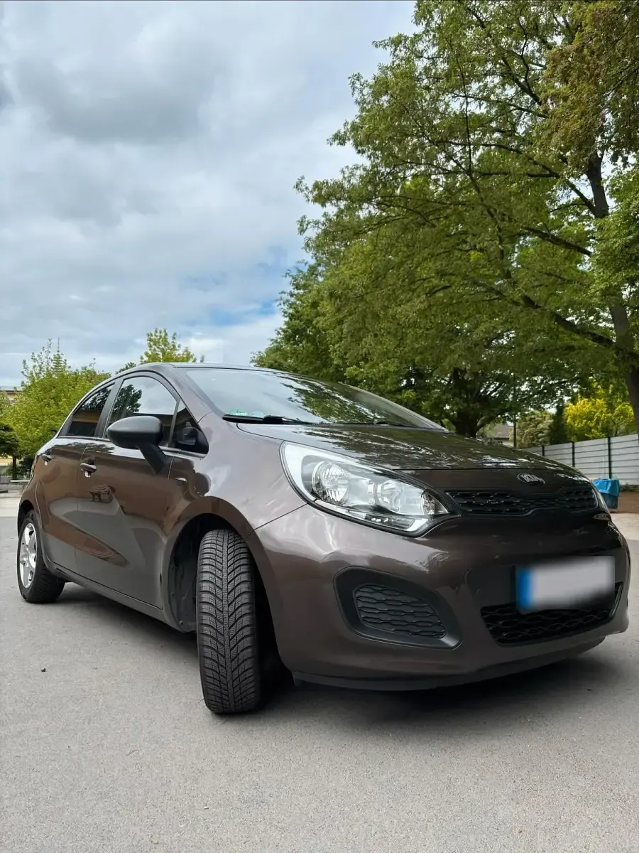 Gebraucht Kia Rio 84 PS (61 kW) 2012 Braun Kleinwagen