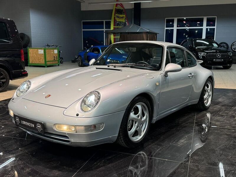 Polarsilber metallic Gebraucht 1995 Porsche 911 Carrera 4 Coupé | 56.900 € - Bild 1/4