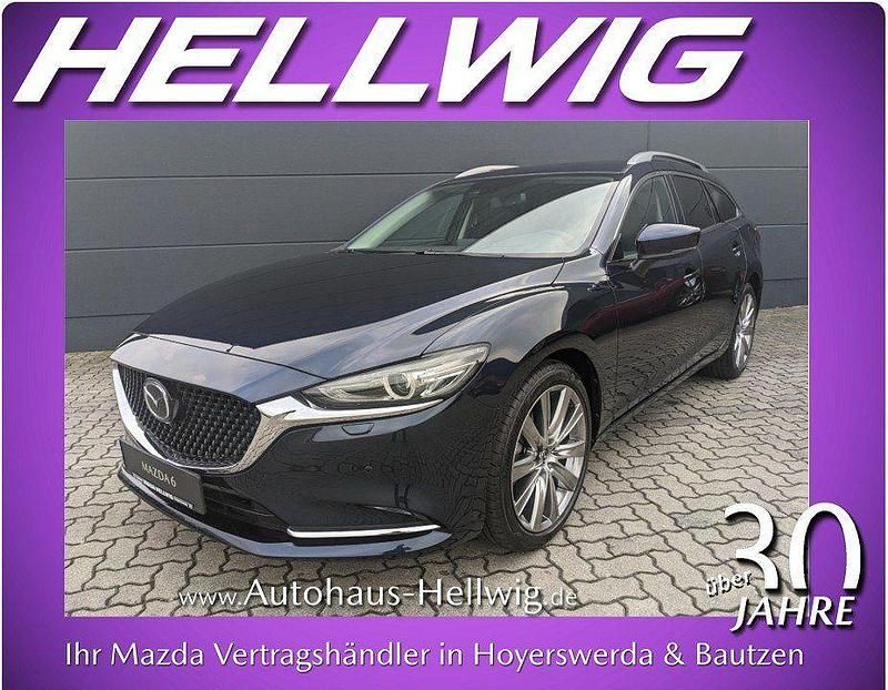 Deep crystal blue metallic (metallic) Gebraucht 2024 Mazda 6 Exclusive Kombi | 28.980 € (Superpreis) - Bild 1/4