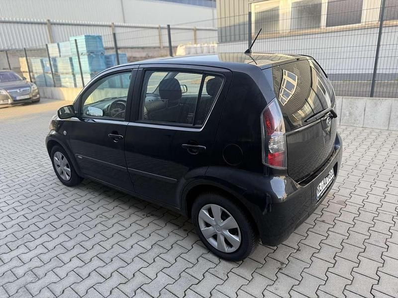 Gebraucht Daihatsu Sirion 70 PS (51 kW) 2010 Schwarz Kleinwagen