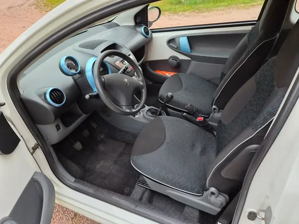 Gebraucht Peugeot 107 Filou 68 PS (50 kW) 2011 Weiß Kleinwagen