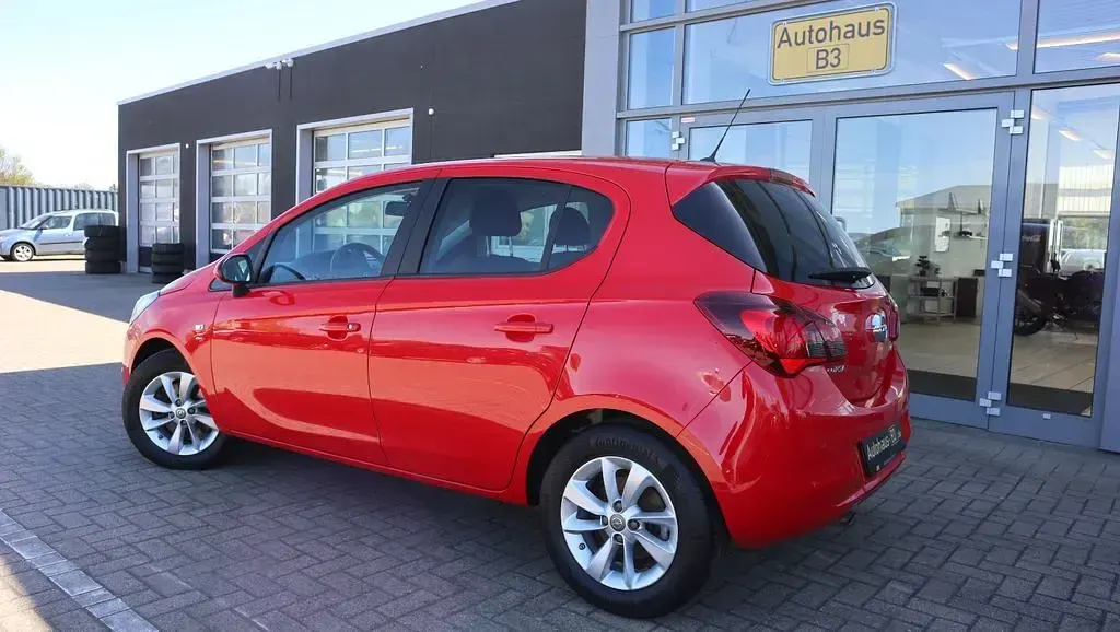 Używany Opel Corsa drive 101 KM (74 kW) 2016 Czerwony Hatchback