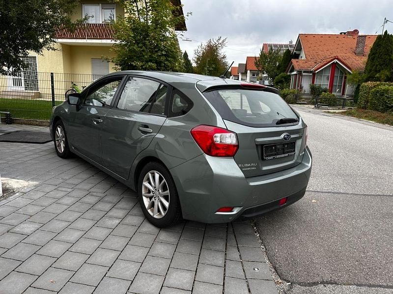 Gebraucht Subaru Impreza Comfort 114 PS (83 kW) 2013 Grün Limousine