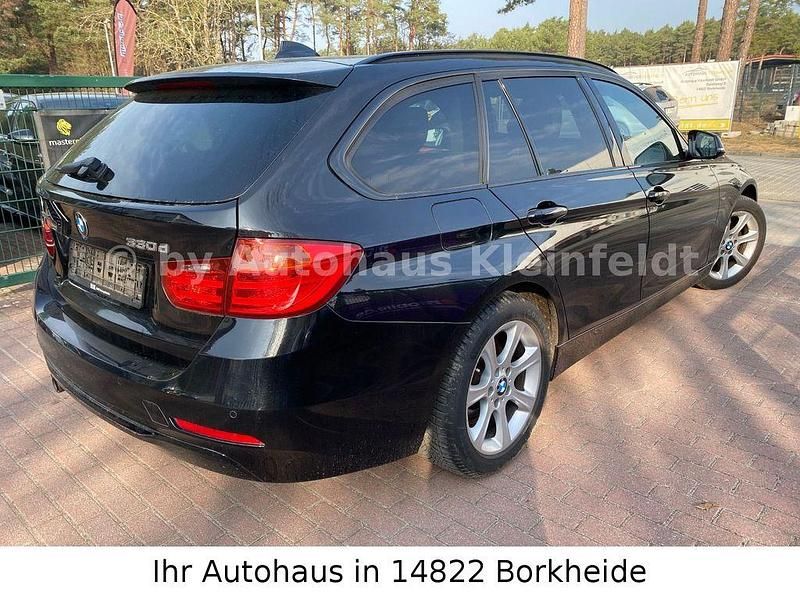 Second-hand BMW 330 258 CP (189 kW) 2014 Negru Break