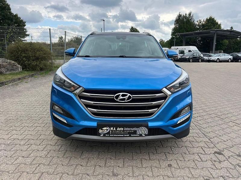 Blau Gebraucht 2016 Hyundai Tucson Premium SUV | 14.490 € (Superpreis) - Bild 1/4