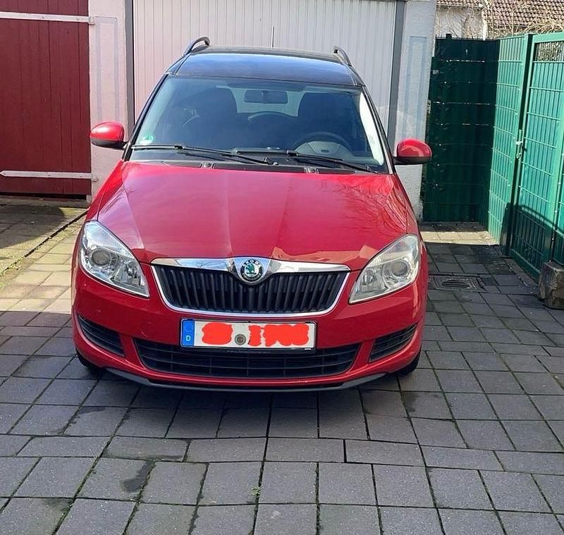 Gebraucht Skoda Roomster 75 PS (55 kW) 2012 Rot Van / Kleinbus