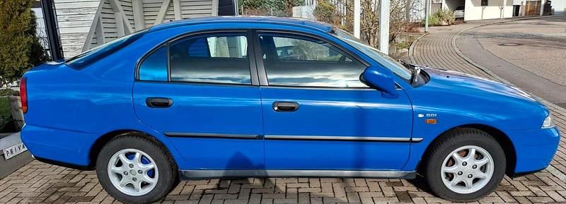 Gebraucht Mitsubishi Carisma 125 PS (91 kW) 1999 Blau Kombi