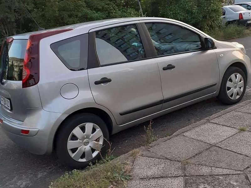 Silber Gebraucht 2013 Nissan Note Visia Van / Kleinbus | 4.150 € (Guter Preis) - Bild 1/4