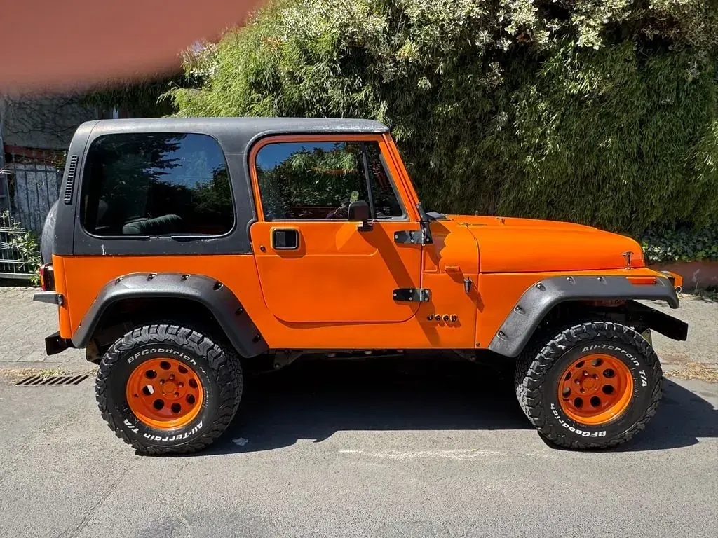 Gebraucht Jeep Wrangler 184 PS (135 kW) 1994 Orange SUV