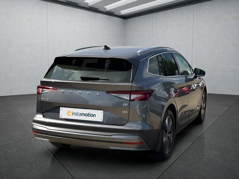 Grau Gebraucht 2023 Skoda Enyaq iV SUV | 40.349 € (Teuer) - Bild 1/4