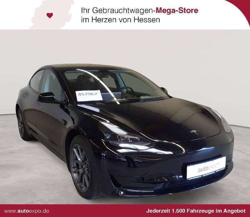 Solid black Gebraucht 2022 Tesla Model 3 Standard Range Plus Limousine | 25.990 € (Guter Preis) - Bild 1/2