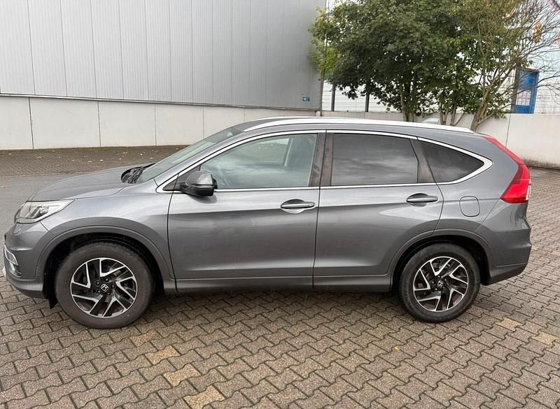 Grau Gebraucht 2017 Honda CR-V Elegance SUV | 14.500 € (Fairer Preis) - Bild 1/4