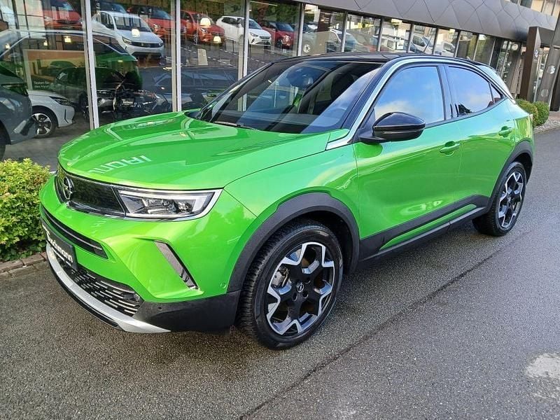 Ikone grün metallic Gebraucht 2022 Opel Mokka-e Ultimate SUV | 21.290 € (Etwas zu teuer) - Bild 1/4