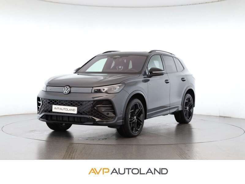 Delfingrau metallic Gebraucht 2025 VW Tiguan R-line SUV | 51.880 € (Superpreis) - Bild 1/4