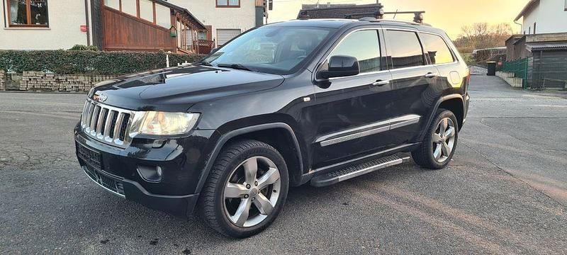 Gebraucht Jeep Grand Cherokee Overland 241 PS (177 kW) 2013 Schwarz SUV