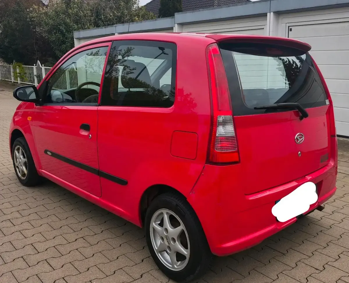 Gebraucht Daihatsu Cuore 58 PS (42 kW) 2005 Rot Kleinwagen