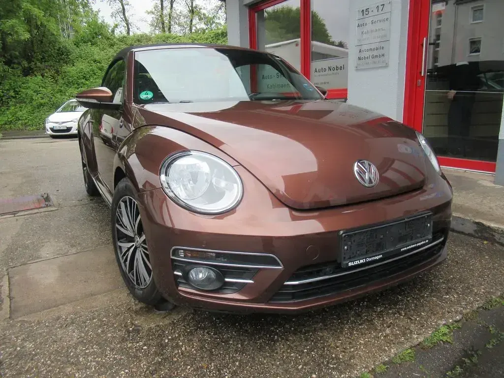 Używany VW Beetle Sound 105 KM (77 kW) 2017 Brązowy Hatchback