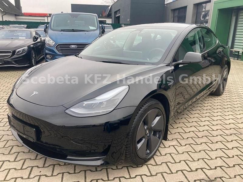 Schwarz Gebraucht 2022 Tesla Model 3 Standard Range Limousine | 26.990 € (Fairer Preis) - Bild 1/4