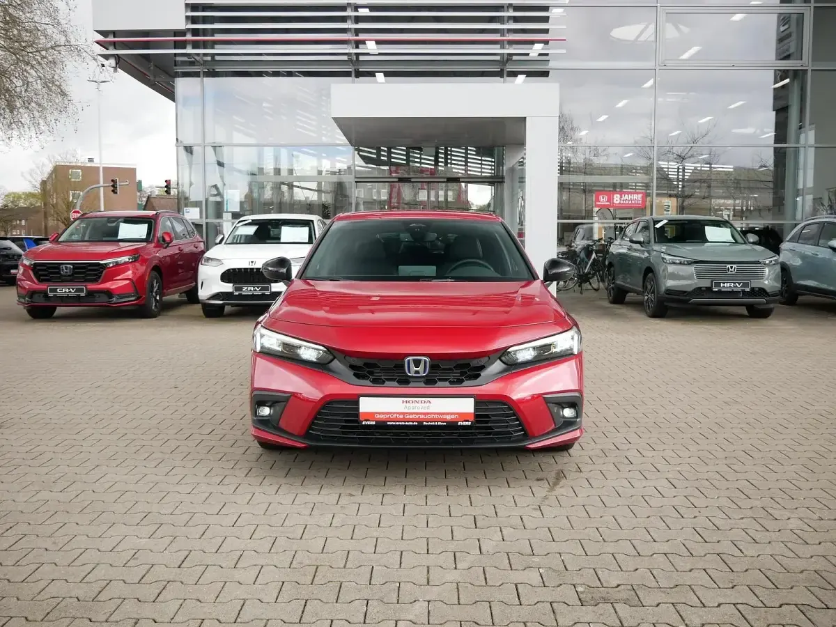 Gebraucht Honda Civic Hybrid 184 PS (135 kW) 2023 Premium crystal red Limousine