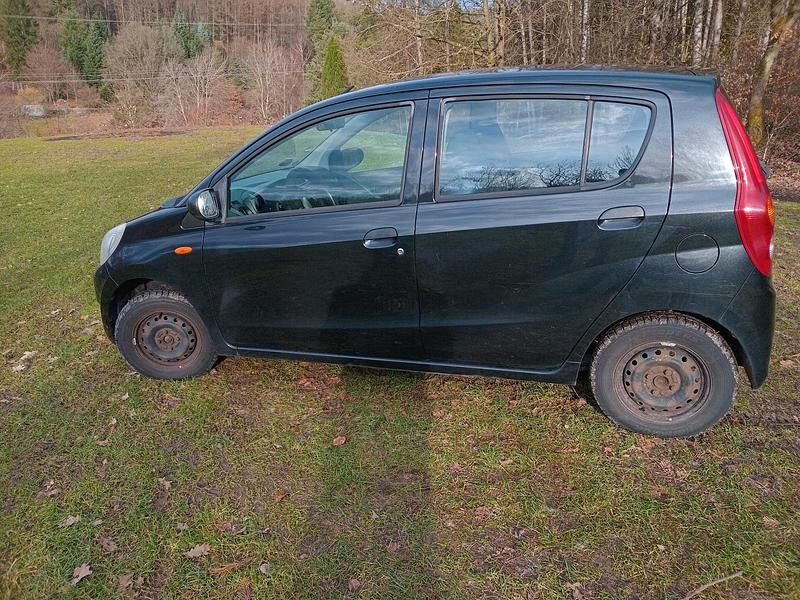 Gebraucht Daihatsu Cuore 69 PS (50 kW) 2009 Schwarz Kleinwagen