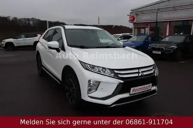 Używany Mitsubishi Eclipse Cross 163 KM (119 kW) 2018 Biały SUV