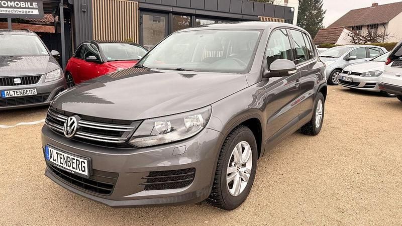 Grau Gebraucht 2014 VW Tiguan SUV | 9.199 € (Fairer Preis) - Bild 1/4