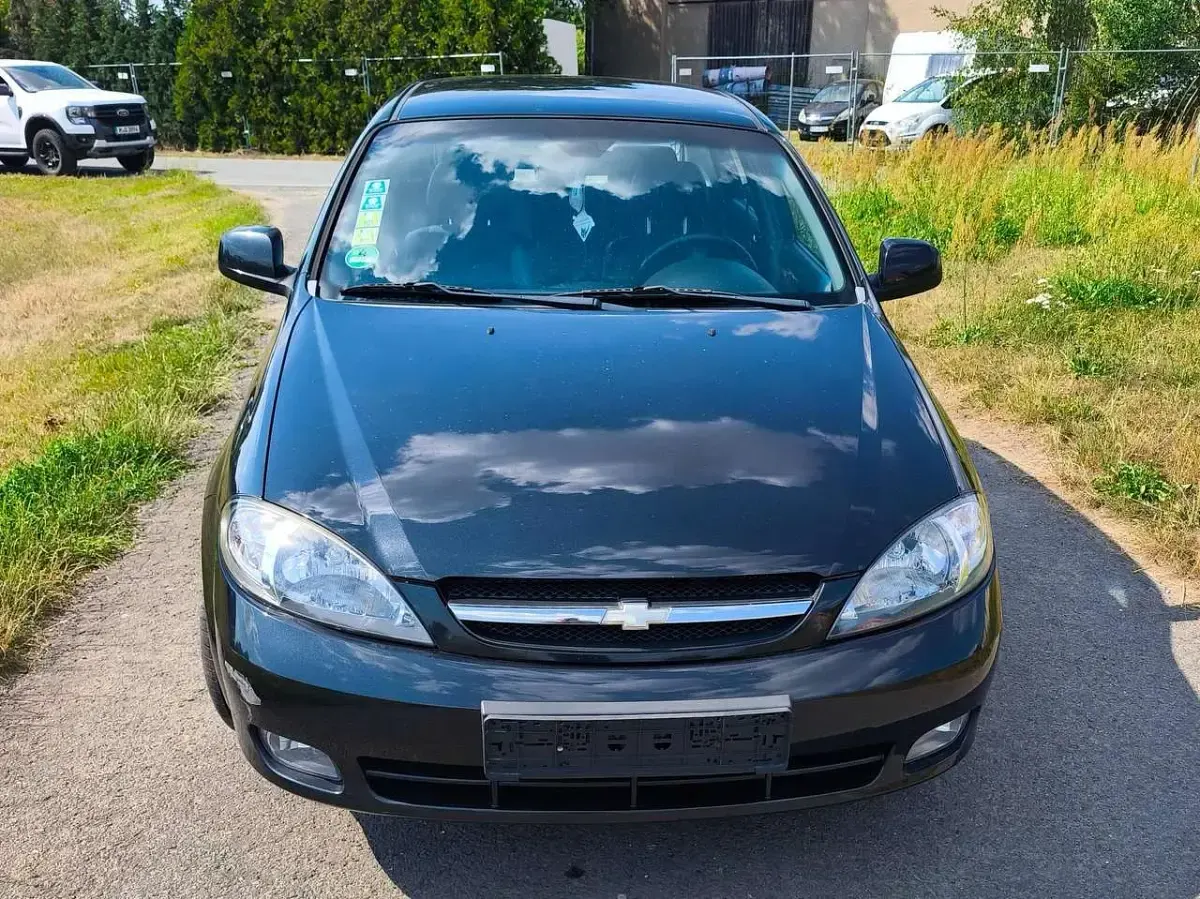 Gebraucht Chevrolet Lacetti CDX 121 PS (88 kW) 2010 Karbonschw graphitschw midnigh Kleinwagen