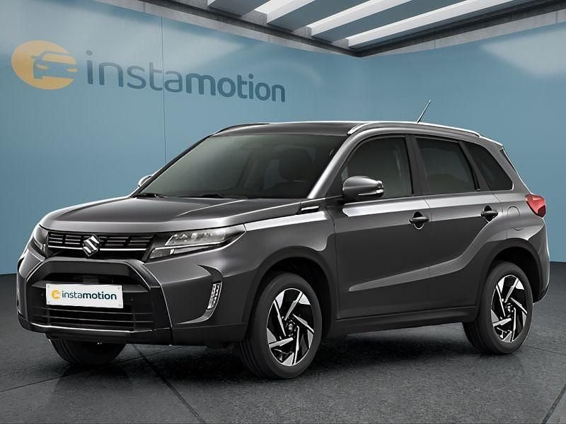 Grau Neu 2025 Suzuki Vitara Comfort+ SUV | 26.199 € (Teuer) - Bild 1/4