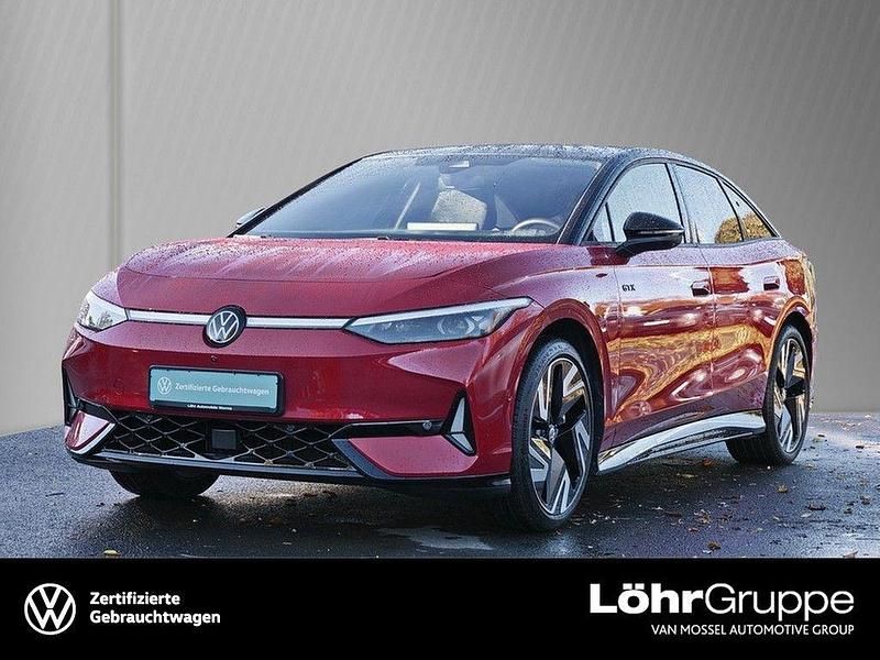 Kings red metallic Gebraucht 2025 VW ID.7 GTX Kleinwagen | 52.990 € - Bild 1/4