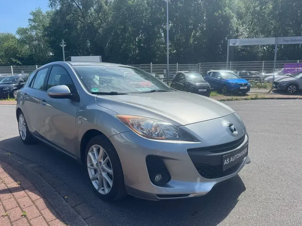 Używany Mazda 3 Center-Line 105 KM (77 kW) 2012 Szary Sedan/Limuzyna