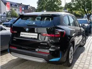 Gebraucht BMW iX1 230 kW (313 PS) 2023 Schwarz (schwarz uni) SUV