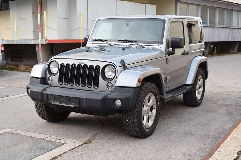 Grau Gebraucht 2016 Jeep Wrangler Sahara SUV | 32.790 € (Guter Preis) - Bild 1/4