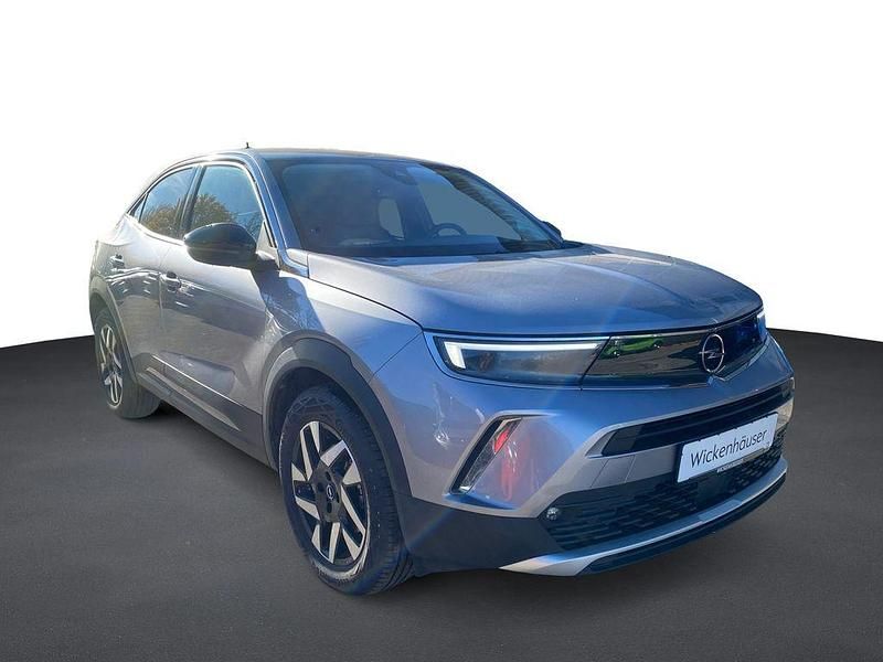 Gebraucht Opel Mokka-e Elegance 100 kW (136 PS) 2022 Kontrast grau/quarz silber SUV