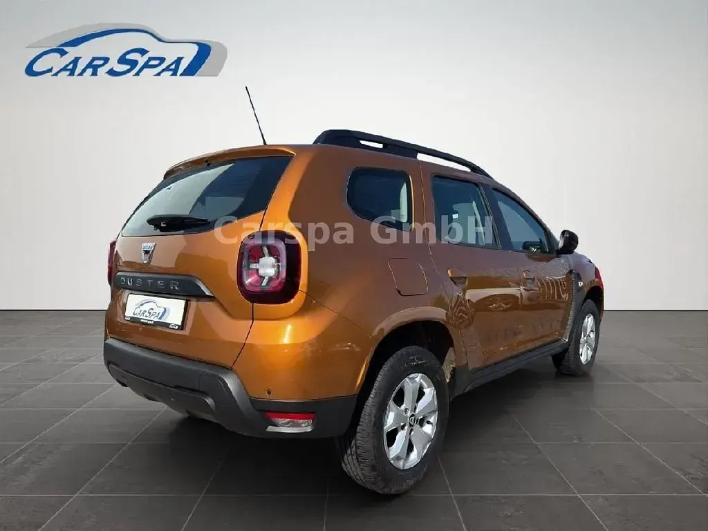Używany Dacia Duster Comfort 101 KM (74 kW) 2020 Pomarańczowy SUV