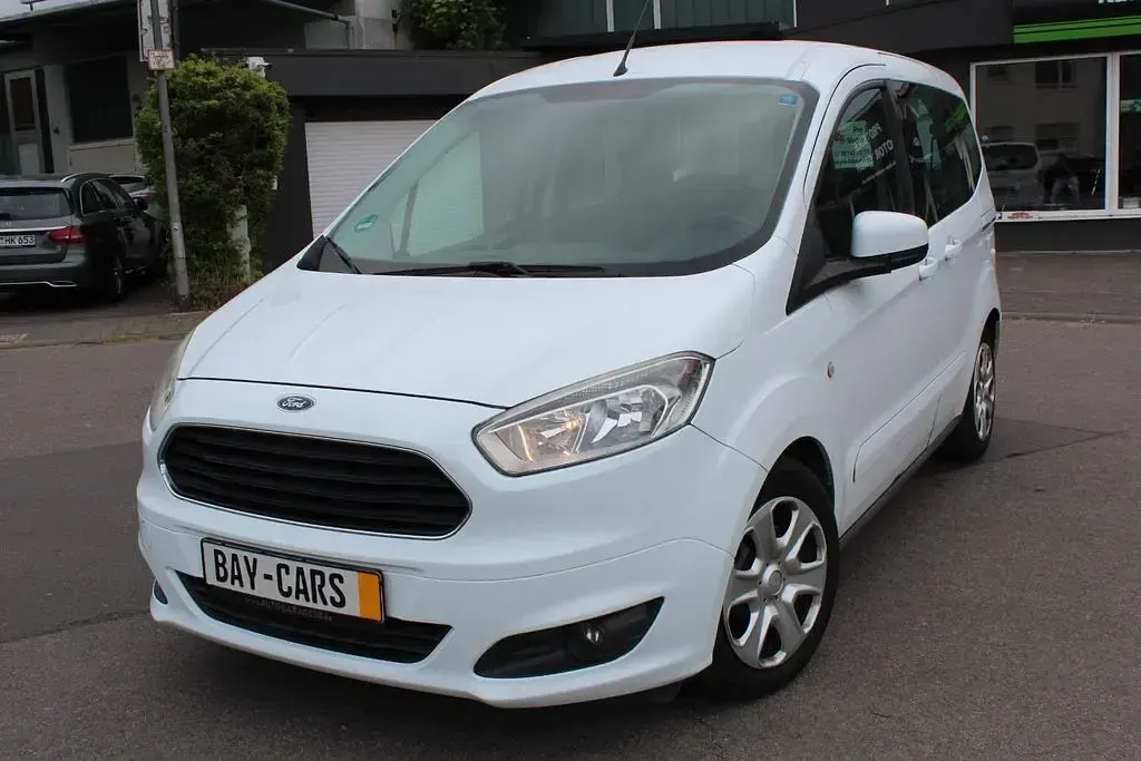 Gebraucht Ford Tourneo Courier 75 PS (55 kW) 2015 Frostweiß Van / Kleinbus