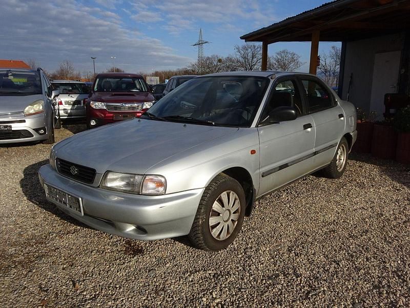 Grau Gebraucht 1996 Suzuki Baleno GL Limousine | 400 € - Bild 1/4