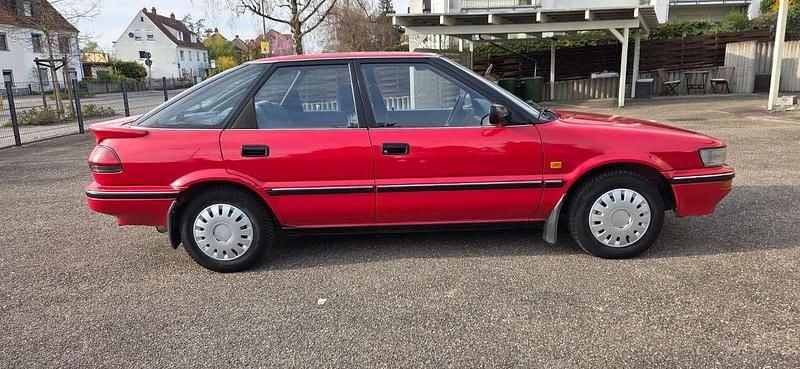 Gebraucht Toyota Corolla 105 PS (77 kW) 1991 Rot Kleinwagen